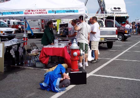 Michael Lapides photographing hydrants.